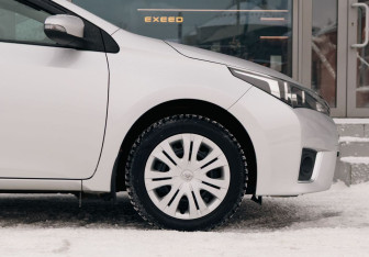 Подержанный автомобиль Toyota Corolla Sedan 2014 года (9 фото)