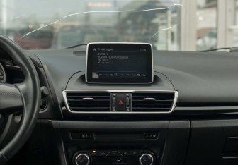 Подержанный автомобиль Mazda 3 Hatchback 2014 года (15 фото)