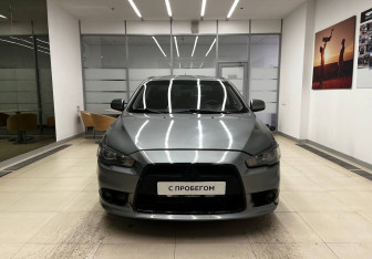 Подержанный автомобиль Mitsubishi Lancer Sedan 2013 года (3 фото)