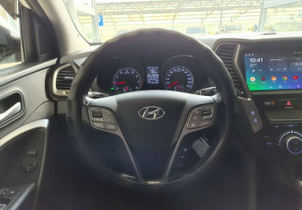 Подержанный автомобиль Hyundai Santa Fe 2015 года (9 фото)