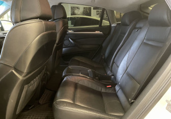 Подержанный автомобиль BMW X6 2013 года (10 фото)