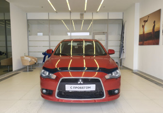 Подержанный автомобиль Mitsubishi Lancer Sedan 2012 года (2 фото)