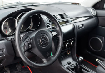 Подержанный автомобиль Mazda 3 Hatchback 2008 года (11 фото)