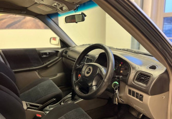 Подержанный автомобиль Subaru Forester Wagon 2000 года (8 фото)