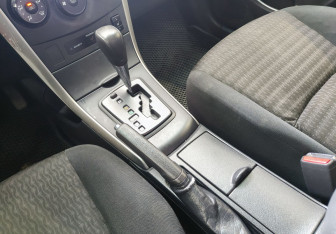 Подержанный автомобиль Toyota Corolla Sedan 2010 года (10 фото)