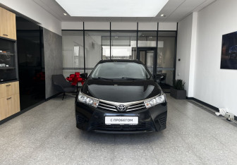 Подержанный автомобиль Toyota Corolla Sedan 2014 года (2 фото)