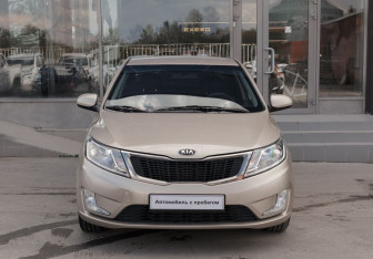 Подержанный автомобиль Kia Rio Sedan 2013 года (2 фото)