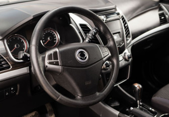 Подержанный автомобиль SsangYong Actyon 2014 года (11 фото)