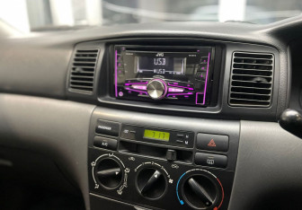 Подержанный автомобиль Toyota Corolla Sedan 2003 года (13 фото)