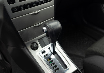 Подержанный автомобиль Toyota Corolla Sedan 2005 года (14 фото)