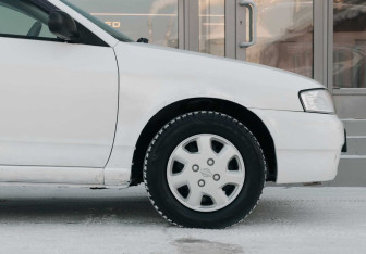 Подержанный автомобиль Nissan Wingroad 2000 года (9 фото)