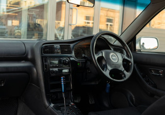 Подержанный автомобиль Subaru Legacy Wagon 2000 года (10 фото)