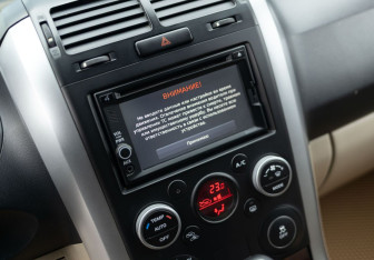 Подержанный автомобиль Suzuki Grand Vitara 2012 года (14 фото)