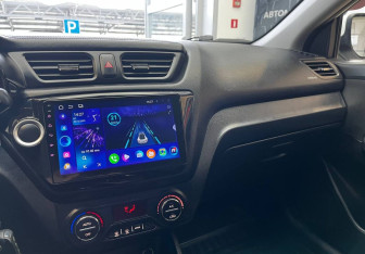 Подержанный автомобиль Kia Rio Sedan 2014 года (8 фото)