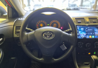 Подержанный автомобиль Toyota Corolla Sedan 2008 года (9 фото)