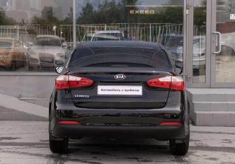 Подержанный автомобиль Kia Cerato Sedan 2013 года (6 фото)