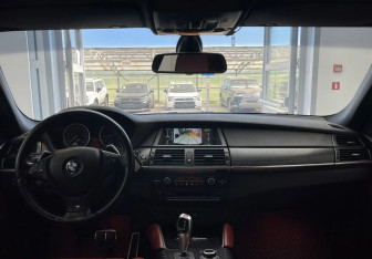 Подержанный автомобиль BMW X6 2013 года (10 фото)