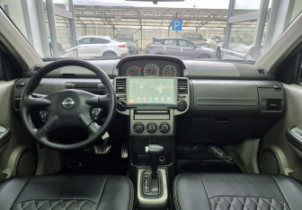 Подержанный автомобиль Nissan X-Trail 2006 года (8 фото)