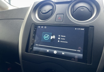 Подержанный автомобиль Nissan Note 2015 года (16 фото)