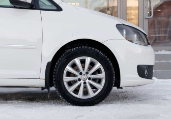 Подержанный автомобиль Volkswagen Touran 2011 года (9 фото)