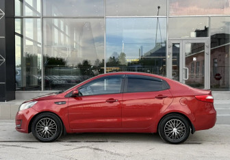 Подержанный автомобиль Kia Rio Sedan 2015 года (8 фото)
