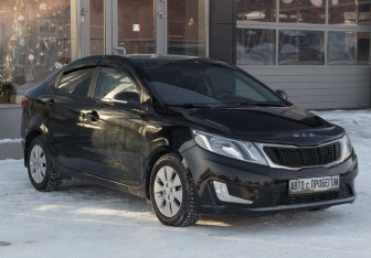 Подержанный автомобиль Kia Rio Sedan 2014 года (3 фото)