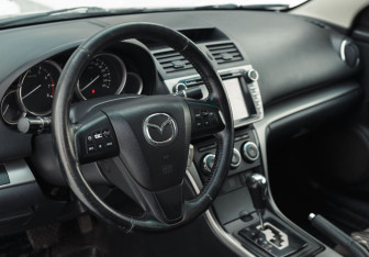 Подержанный автомобиль Mazda 6 Sedan 2010 года (11 фото)