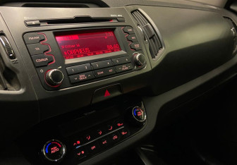 Подержанный автомобиль Kia Sportage 2012 года (11 фото)