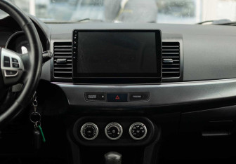 Подержанный автомобиль Mitsubishi Lancer Hatchback 2008 года (14 фото)