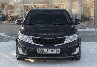 Подержанный автомобиль Kia Rio Sedan 2014 года (2 фото)
