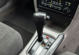 Подержанный автомобиль Toyota Caldina 2000 года (13 фото)