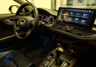 Подержанный автомобиль Audi A7 2010 года (13 фото)