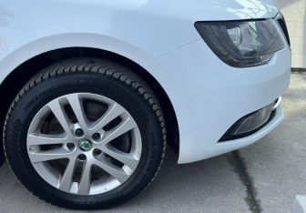 Подержанный автомобиль Skoda Superb Liftback 2014 года (12 фото)