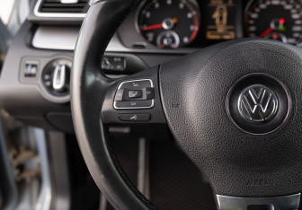 Подержанный автомобиль Volkswagen Passat Sedan 2012 года (12 фото)
