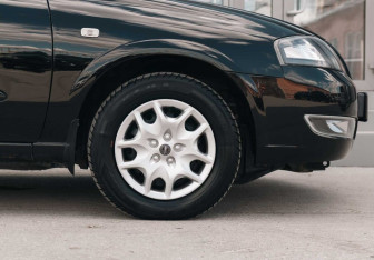 Подержанный автомобиль Nissan Almera Classic 2011 года (9 фото)