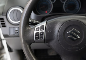 Подержанный автомобиль Suzuki SX4 Sedan 2013 года (12 фото)