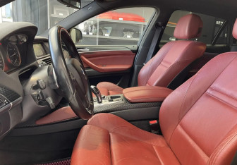 Подержанный автомобиль BMW X6 2013 года (8 фото)
