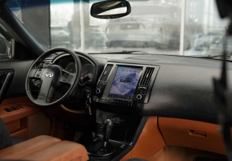 Подержанный автомобиль Infiniti FX 2003 года (10 фото)