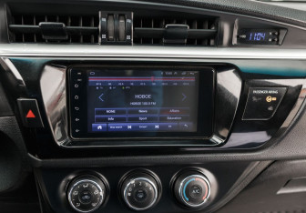 Подержанный автомобиль Toyota Corolla Sedan 2013 года (14 фото)