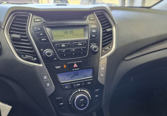 Подержанный автомобиль Hyundai Santa Fe 2012 года (12 фото)