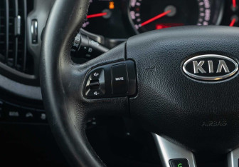 Подержанный автомобиль Kia Sportage 2011 года (12 фото)