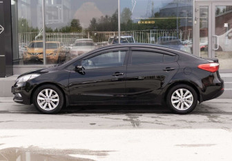 Подержанный автомобиль Kia Cerato Sedan 2013 года (8 фото)