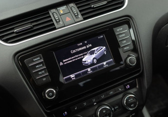 Подержанный автомобиль Skoda Octavia Liftback 2015 года (14 фото)