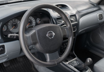 Подержанный автомобиль Nissan Almera Sedan 2006 года (11 фото)