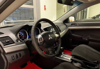 Подержанный автомобиль Mitsubishi Lancer Sedan 2013 года (13 фото)