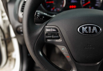 Подержанный автомобиль Kia Cerato Sedan 2013 года (12 фото)