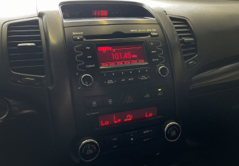 Подержанный автомобиль Kia Sorento 2012 года (14 фото)