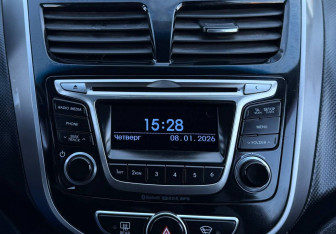 Подержанный автомобиль Hyundai Solaris Sedan 2014 года (16 фото)