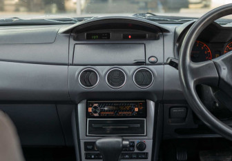 Подержанный автомобиль Nissan Avenir 2001 года (13 фото)