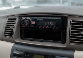 Подержанный автомобиль Toyota Corolla Wagon 2002 года (13 фото)